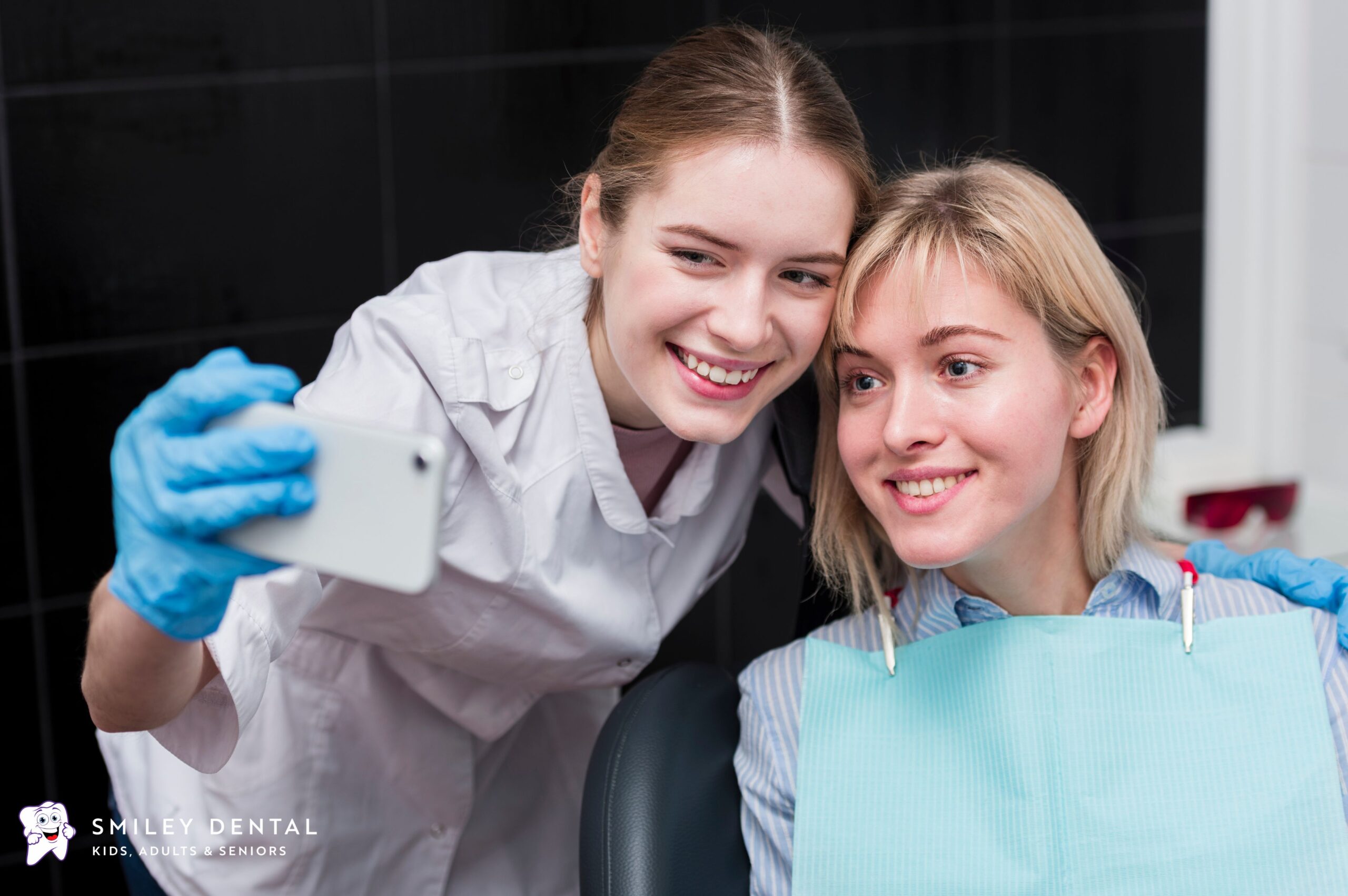 Smiley Dental Boston dentist and patient smiling together during a dental visit