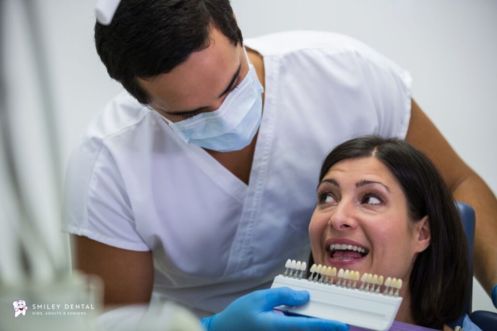Patient discussing dental bonding and veneers with a dentist